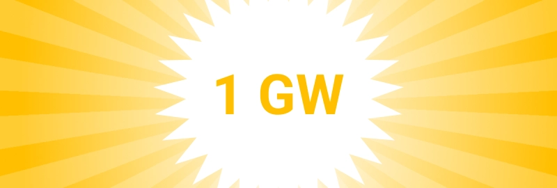 news-1-gigawatt-order intake header mobile White sun with the text "1GW", yellow rays in the background